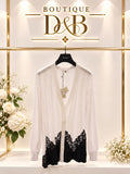 Cardigan bianco lungo con inserti in pizzo nero